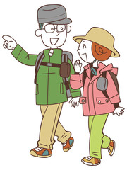 ハイキングする夫婦