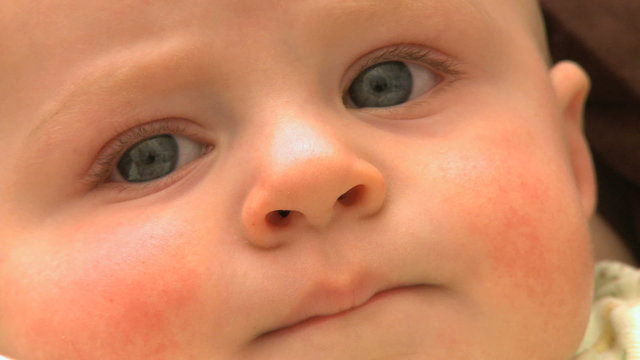 Shots of an infant boy resting