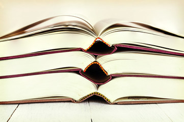 Old books on wooden table - vintage look