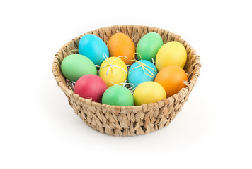 Basket with colorful Easter eggs
