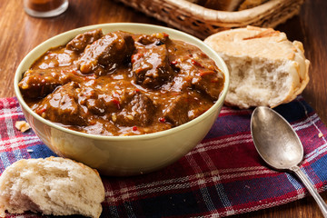 Beef stew served with crusty bread