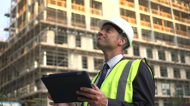 Male architect with digital tablet