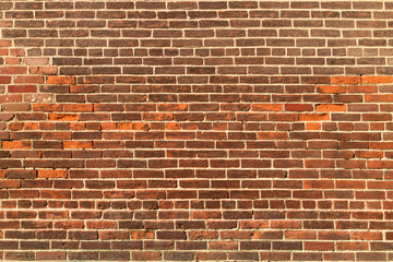 Crack brown brick wall texture.