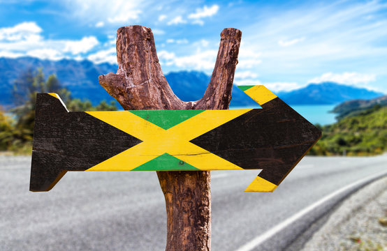 Jamaica Flag sign with road background