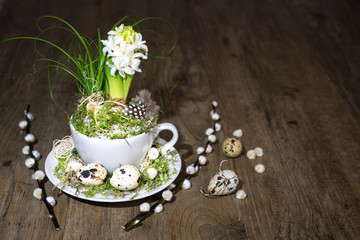 Easter decorations with white pearl hyacinth on wood