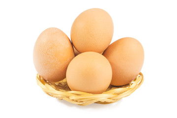 Eggs in a basket on a white background