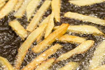 French fries fried in a pan