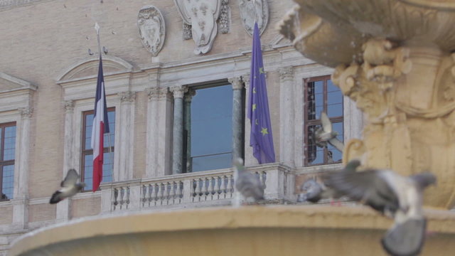 One of the two fountains and the french Embassy in Farnese square, Rome, Italy