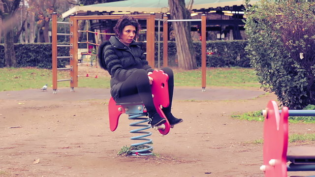 35 years woman playing in playground area