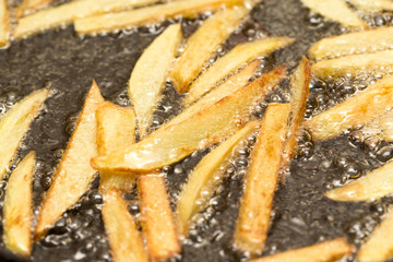 French fries fried in a pan