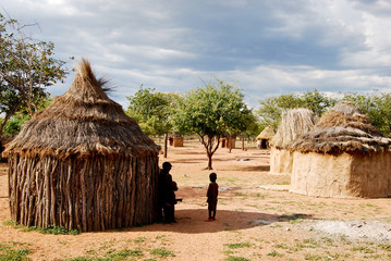 Himba village near the Etosha National Park in Namibia - obrazy, fototapety, plakaty