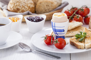 English breakfast on white wooden table