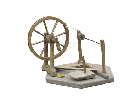 Old manual wooden spinning-wheel distaff isolated on white