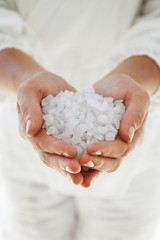 hands making beauty treatment the scrub with salt