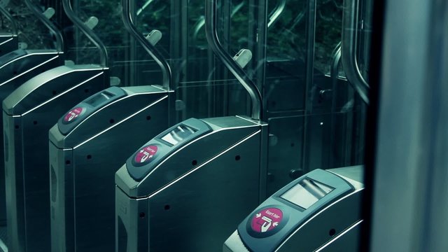 Commuter touching transport card on reader