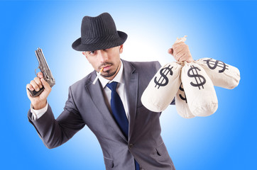 Businessman criminal with sacks of money