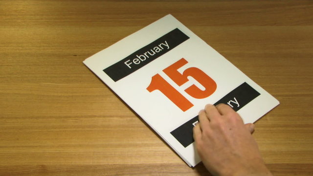 WS, Time lapse, Fast forward turning pages on Calender on office desk