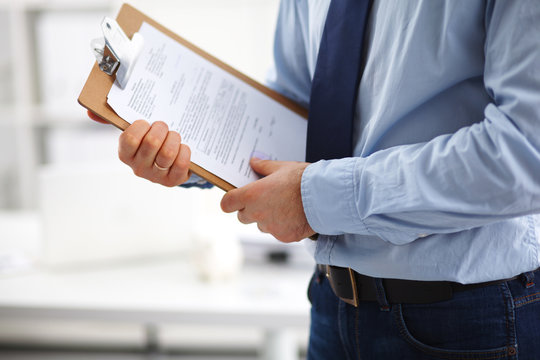 Businessman Hold With Clipboard