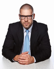 Business man in a suit isolated on white