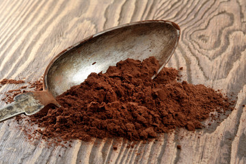 Cocoa powder on wood table.