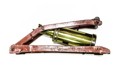 Red copper antique foot pump on the white background