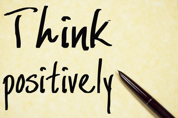 think positively text write on paper