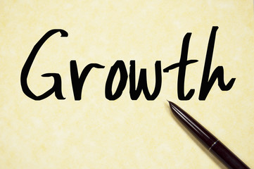 growth word write on paper