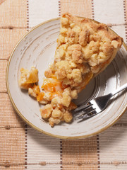 Peach and ginger pie on plate