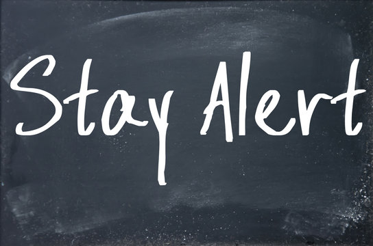 stay alert text write on blackboard