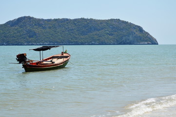 Fototapeta na wymiar fishery boat on the seashore