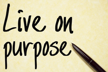 live on purpose text write on paper