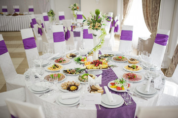 Banquet wedding table setting on evening reception