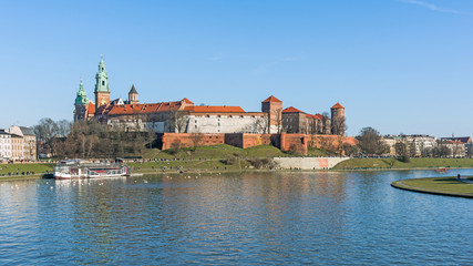Fototapeta na wymiar The Royal Castle at the Wawel Hill in Krakow