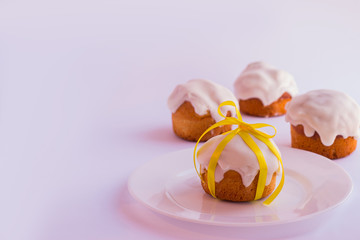 Easter cake on the plate on a white background. Selective focus.
