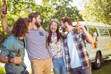 Hipster friends having a beer together