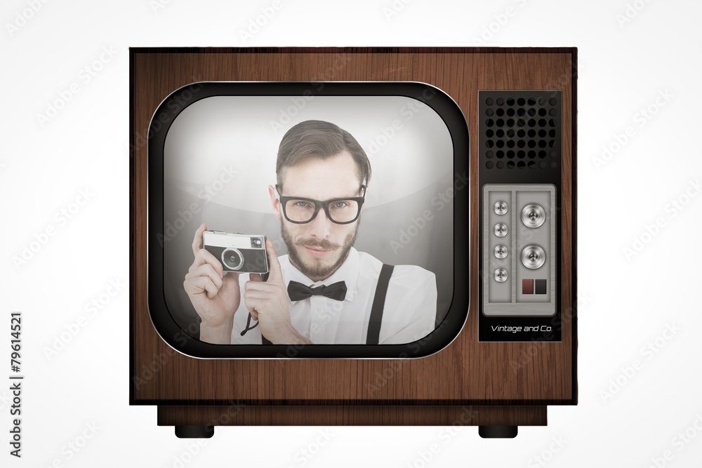 Aufkleber Composite image of geeky hipster holding a retro camera