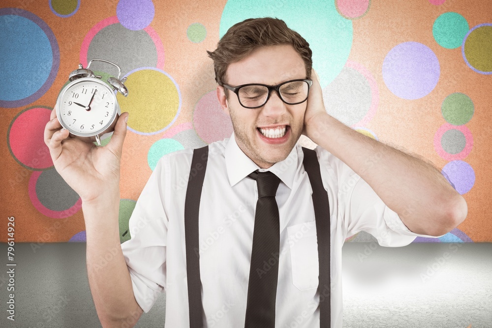 Aufkleber composite image of geeky businessman holding alarm clock