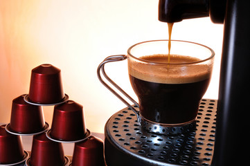 machine serving espresso coffee in a cup