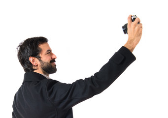Handsome man making a selfie