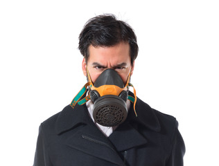 Handsome man in gas mask