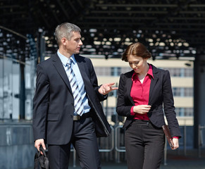 business man and woman outdoor