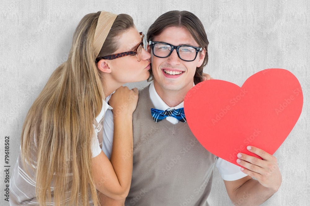Aufkleber Composite image of smiling geeky hipster and his girlfriend
