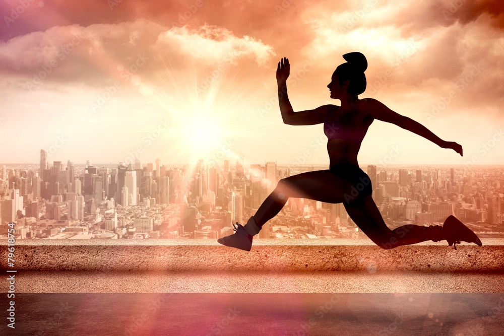 Aufkleber Composite image of fit brunette running and jumping