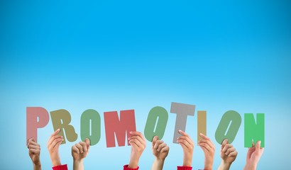 Composite image of hands holding up promotion