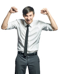 Businessman doing victory gesture and smiling.