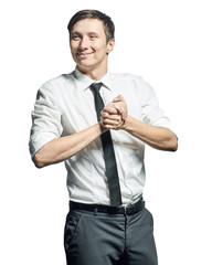 Businessman in shirt and tie gesturing success sign and smiling.