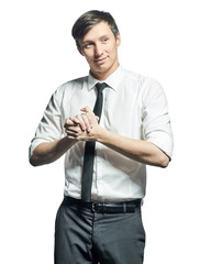 Businessman in shirt and tie gesturing success sign and smiling.