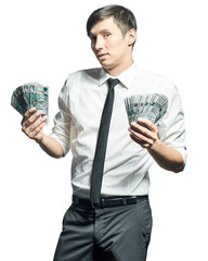 Young businessman with money  isolated on white background.