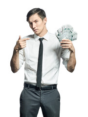 Businessman shows a wad of cash in hand.