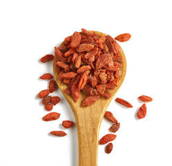 goji beries on a wooden spoon